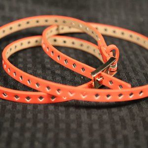 Coral Colored Women's Perforated Skinny Belt
